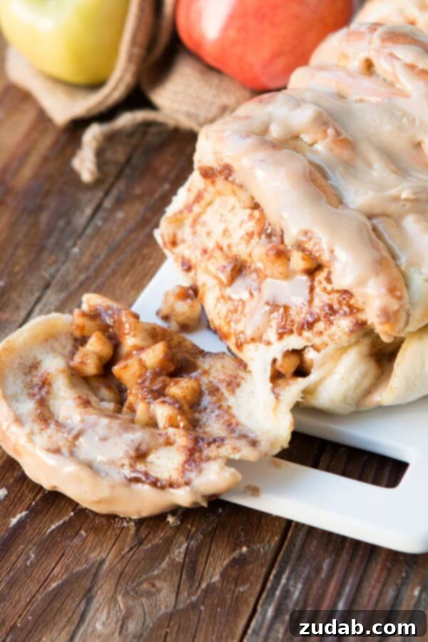 This is our new breakfast tradition, apple pie pull apart bread with maple glaze and it only takes frozen roll dough to get started! This is our new breakfast tradition, apple pie pull apart bread with maple glaze and it only takes frozen roll dough to get started!