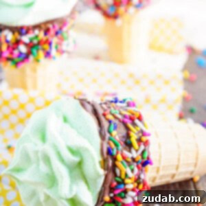A vibrant Meringue Ice Cream Cone, ready to be enjoyed, showcasing its colorful appeal.