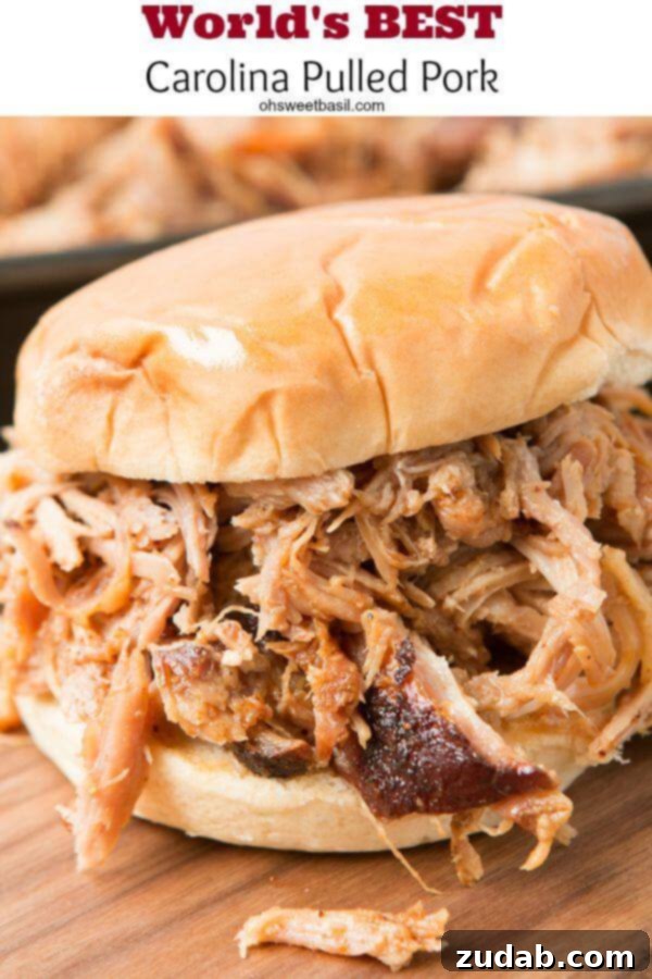 Want to make the best pulled pork from your own kitchen? This recipe for the world's best Carolina pulled pork all starts with a brine. Carolina pulled pork recipe on a cutting board, ready to be served