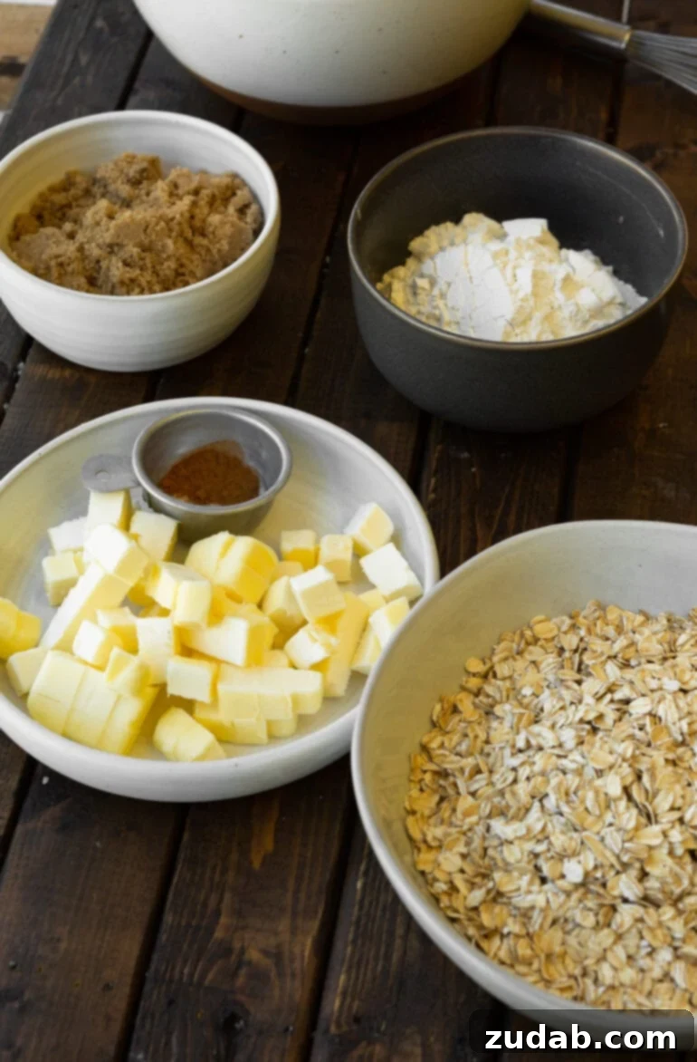 The Ultimate Homemade Apple Crisp 4 A visually appealing collection of individual bowls, each showcasing the distinct ingredients required to create the perfect apple crisp topping, highlighting the freshness and quality of each component.