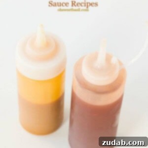 Carolina's Signature Mustard and Vinegar BBQ Sauces 2 Two jars of homemade Carolina Mustard BBQ Sauce and Vinegar Sauce, perfect for enhancing any barbecue feast.