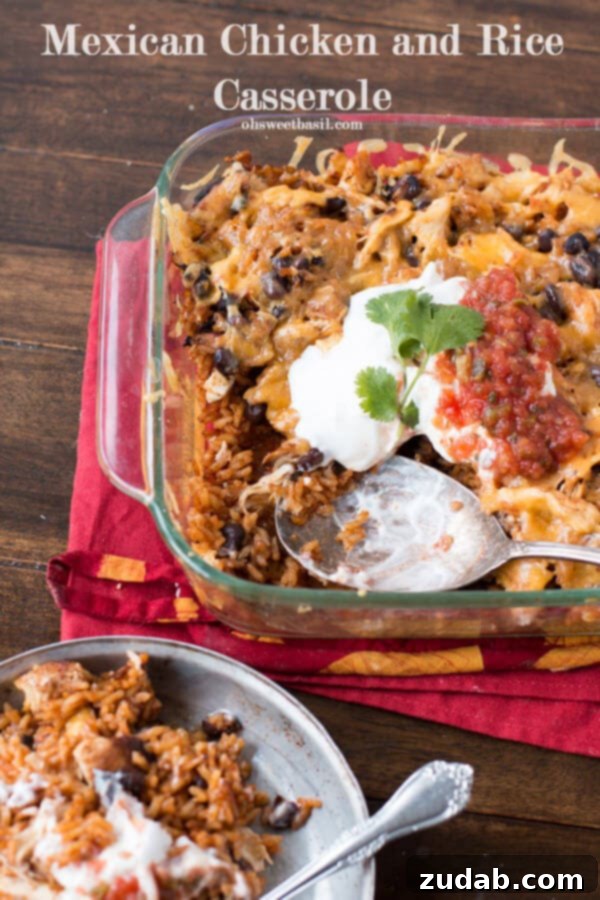 Hearty and flavorful Mexican chicken and rice casserole, a one-pan meal perfect for an easy weeknight dinner. ohsweetbasil.com