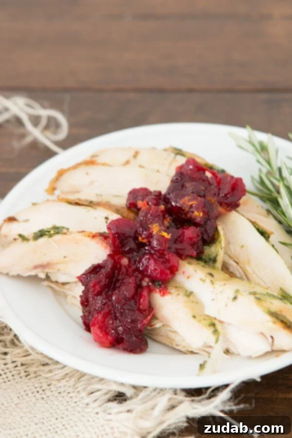Our favorite cranberry sauce with a hint of orange and a secret ingredient that you will love! ohsweetbasil.com Better than Grandma's Spiced Orange Blackberry Cranberry Sauce