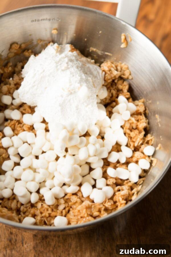 Gooey Fluffernutter Rice Krispies: The Ultimate No-Bake Peanut Butter Marshmallow Treat Generous squares of Gooey Fluffernutter Rice Krispies, perfect for sharing (or not!).