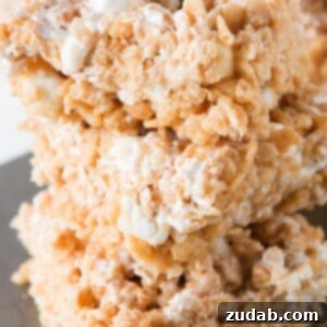 Gooey Fluffernutter Krispie Delights 3 Featured image: Gooey Fluffernutter Rice Krispies, a quick and easy no-bake recipe from Oh Sweet Basil.