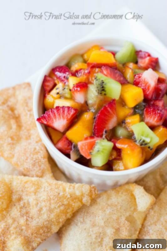 Zesty Garden Salsa 3 A vibrant bowl of fresh fruit salsa with cinnamon sugar tortilla chips, a quick and easy fruit salsa recipe