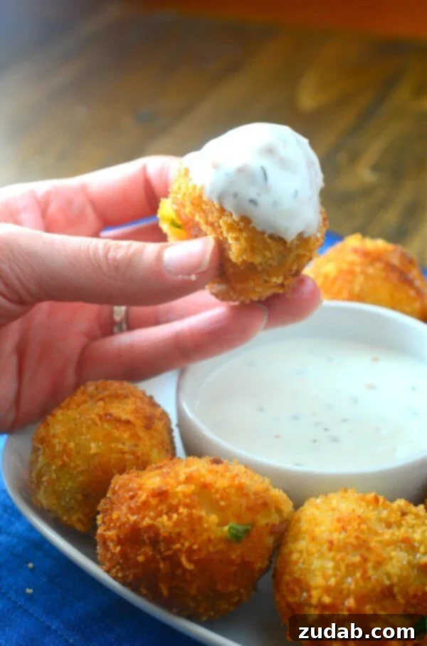 Crispy Exterior and Cheesy Interior of Potato Bombs