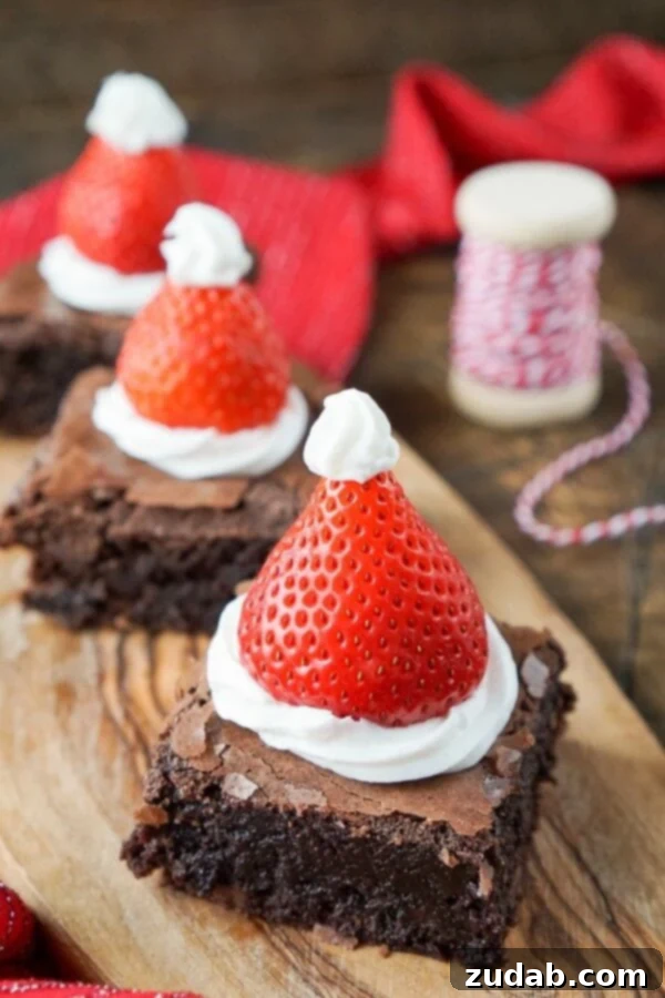Festive Santa Hat Brownies - Easy Holiday Chocolate Dessert Festive Santa Hat Brownies, a simple and rich chocolate dessert for the holidays that everyone will love.