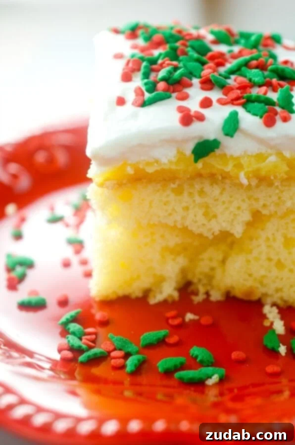 Festive Eggnog Poke Cake for Christmas Delicious Eggnog Poke Cake, a perfect festive Christmas dessert for the holidays