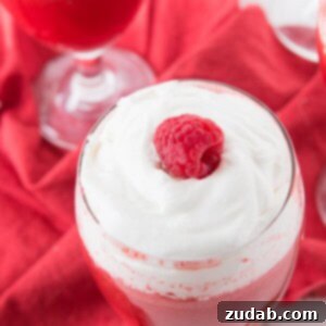 Delicious Raspberry Jello Fluff dessert, a light and creamy treat.