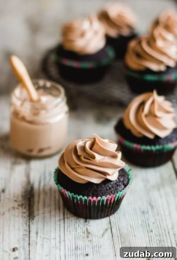 Baked Milk Chocolate Cupcakes A tray of freshly baked milk chocolate cupcakes, ready for frosting.