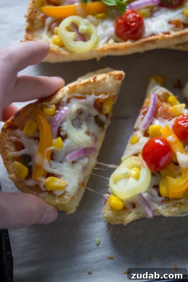 Crispy French Bread Pizza with Southwestern flavors like corn, peppers, onions, and melted cheese.