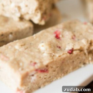 Strawberry Dream Protein Bars 2 strawberries and cream dairy free protein bars ohsweetbasil.com