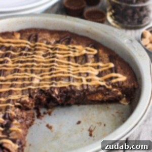 Peanut Butter Brownie Dream Cake 2 This fudgy peanut butter brownie cake recipe is a fun take on brownies! Full of chocolate and peanut butter flavor, this dessert feeds a crowd.