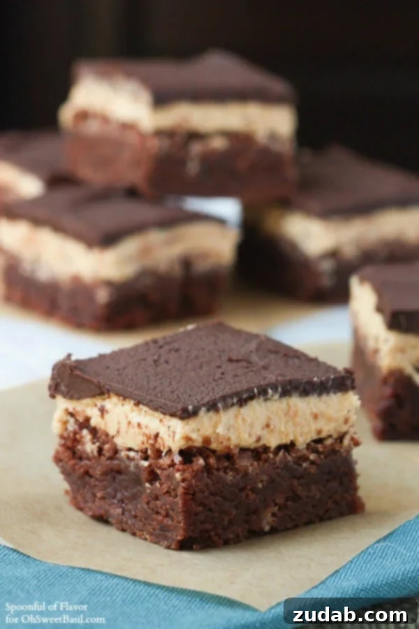 Peanut Butter Brownie Dream Cake 4 Chocolate Peanut Butter Triple Layer Brownies - irresistible and full of chocolate peanut butter flavor! #dessert