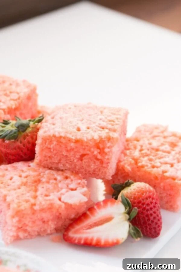Vibrant Lemon Strawberry Jello Cake Lemon Strawberry Jello Cake with a rich, vibrant color, ready to be served.
