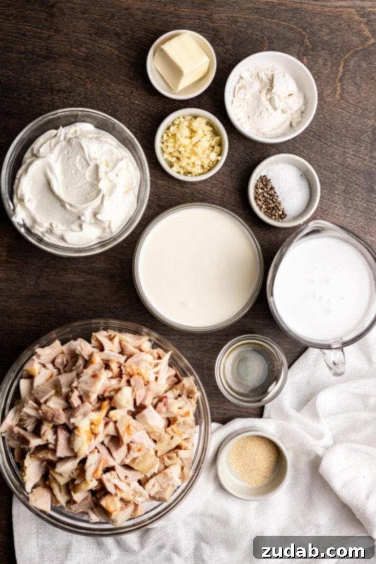 Ditch the soup cans and Chinese noodles, this is ultimate Hawaiian haystacks recipe and you're going to go crazy for them! The creamy Hawaiian Haystacks sauce ingredients ready to go, featuring coconut milk, chicken broth, garlic, onion, butter, and cornstarch for the perfect silky base.
