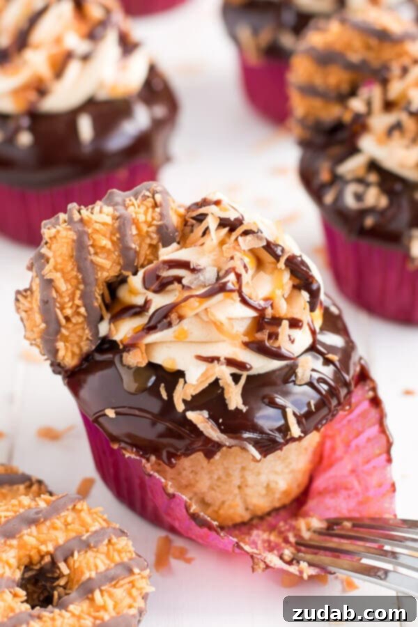 Island Caramel Coconut Cupcakes 3 Girl scout cookie meets cupcake in these rich chocolaty, caramel, and toasted coconut Samoa Cupcakes!