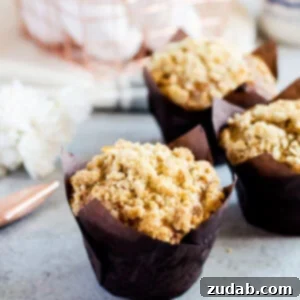 Spiced Carrot Streusel Muffins 2 A beautifully decorated carrot cake muffin with a delightful crumb topping.
