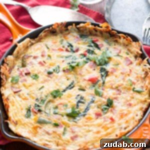 Love hash browns and eggs? Then you're going to adore this hash browns crusted frittata! ohsweetbasil.com
