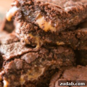 I grew up with Mom's famous caramel brownies made from a cake mix but we've finally created a caramel brownies from scratch!