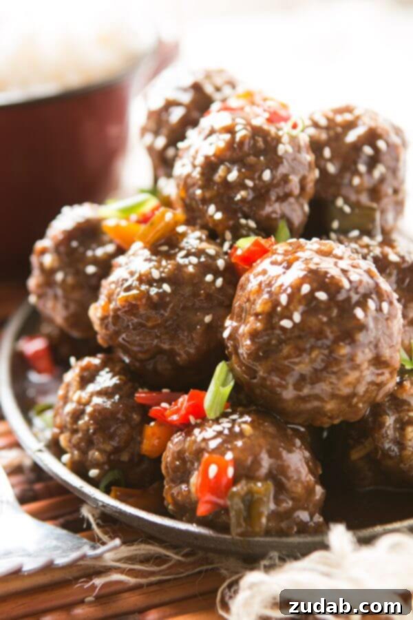 Versatile Sweet and Sour Meatball Recipe These sweet and sour meatballs are a fantastic appetizer or dinner option, easily made in the oven, slow cooker, or Instant Pot.