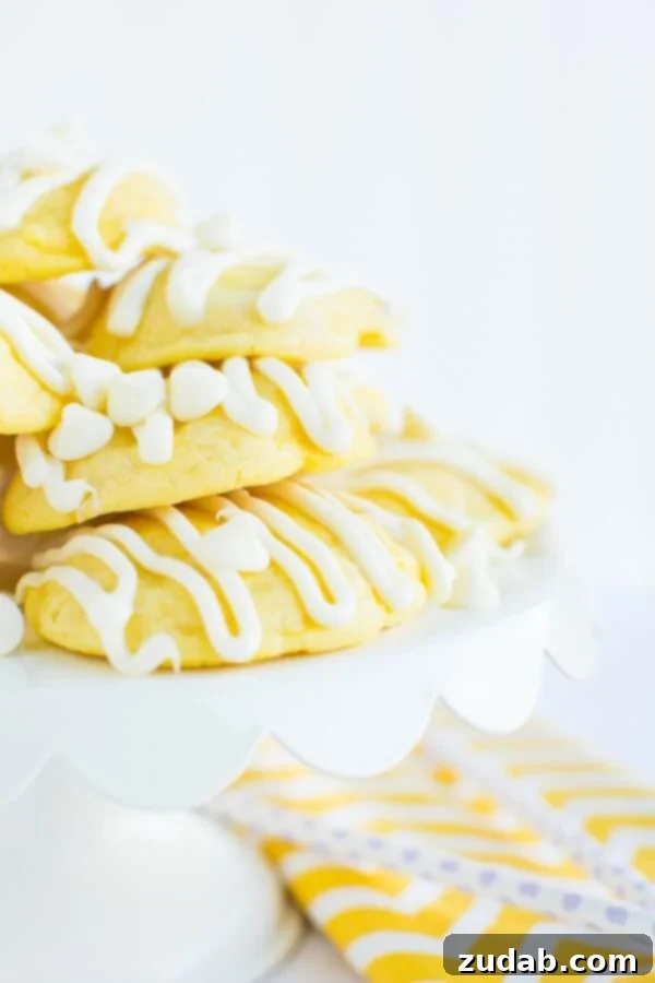 Delicious Lemon Cremesicle Cookies with Zesty Cream Cheese Filling Soft and chewy lemon cremesicle cookies stuffed with a sweet, tangy cream cheese filling and drizzled in white chocolate!