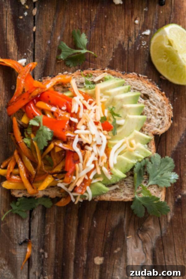 Beyond Basic: 6 Epic Avocado Toast Ideas 11 Flavorful Fajita Avocado Toast with sautéed peppers and cheese.