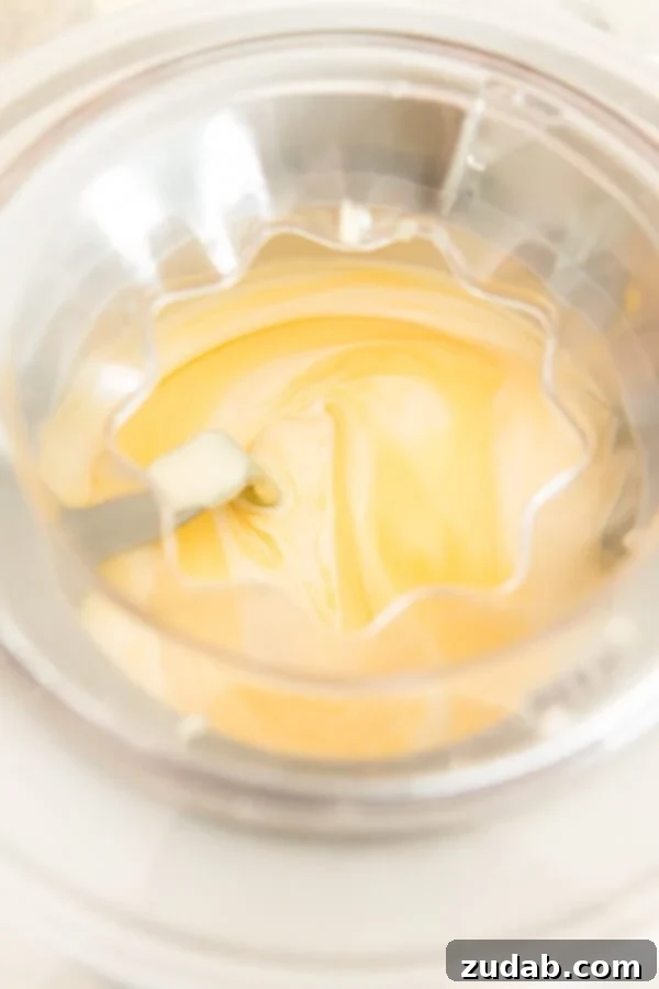 Step-by-step process of tempering egg yolks for frozen custard. Step-by-step process of tempering egg yolks for frozen custard.
