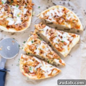 Quick & Easy BBQ Pulled Pork Pizza 2 Four slice of easy Pulled Pork Pizza next to a whole flatbread pulled pork pizza.