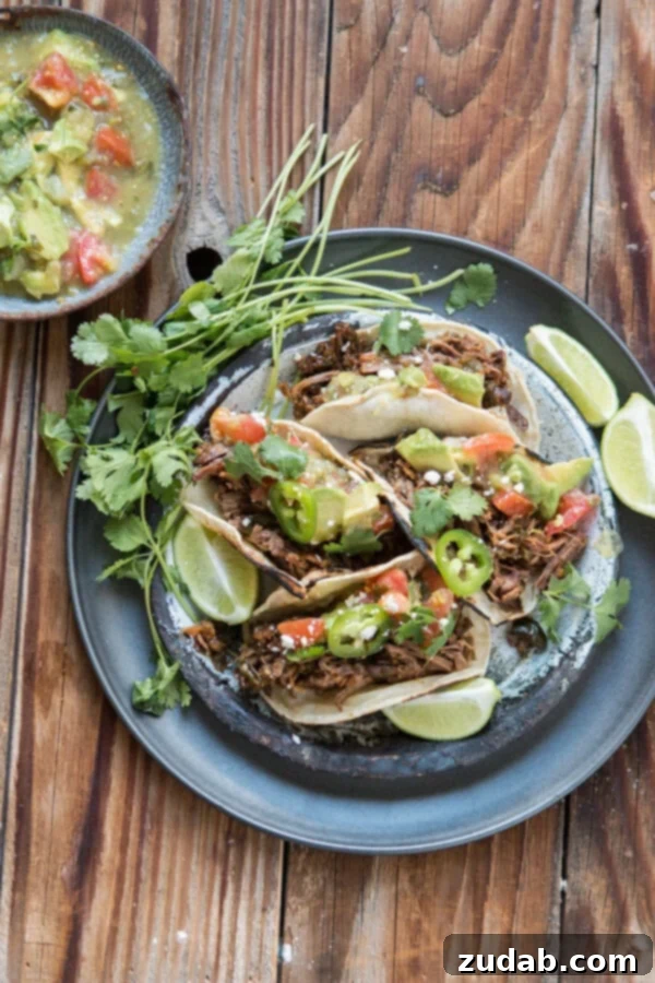 Poblano Braised Beef Tacos: The Ultimate Taco Tuesday Upgrade Tender poblano braised beef tacos with fresh toppings, perfect for Taco Tuesday