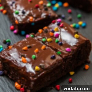 The Ultimate Cosmic Brownie Recipe 2 A fudgy brownie with little pieces of rainbow chip candies to make the best Cosmic Brownies Copycat Recipe