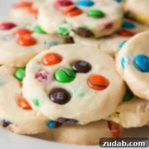 Buttery shortbread m&m cookies! We love making these cookies for school lunches, picnics at the park, or lazy Sunday afternoons! ohsweetbasil.com