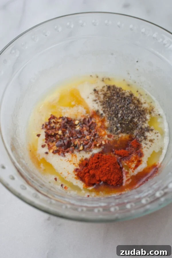 Irresistible Garlic Parmesan Grilled Wings 3 garlic parmesan wing sauce ingredients in glass bowl