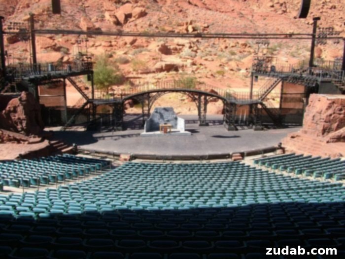 Experience live theater at Tuacahn Amphitheatre The breathtaking outdoor stage of Tuacahn Amphitheatre set against the red rock canyon