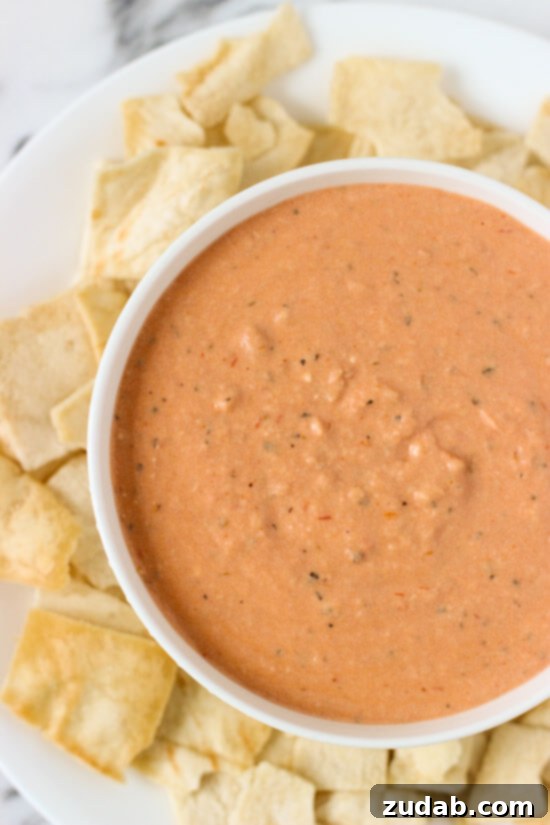 Ultimate Cheesy Bean Dip 6 A bowl of easy warm Italian dip with bread sticks
