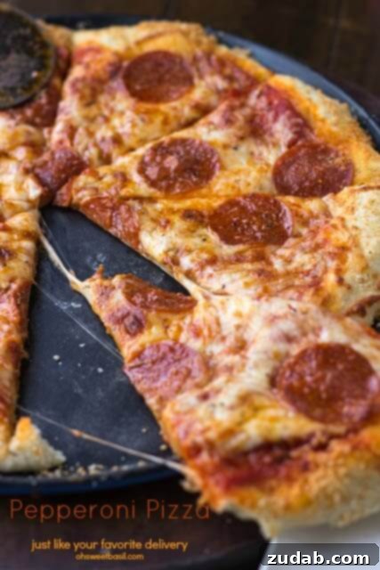Wholesome Zucchini Pizza Base 4 A classic pepperoni pizza, perfectly baked with crispy edges and melted cheese, ready for a cozy night in.