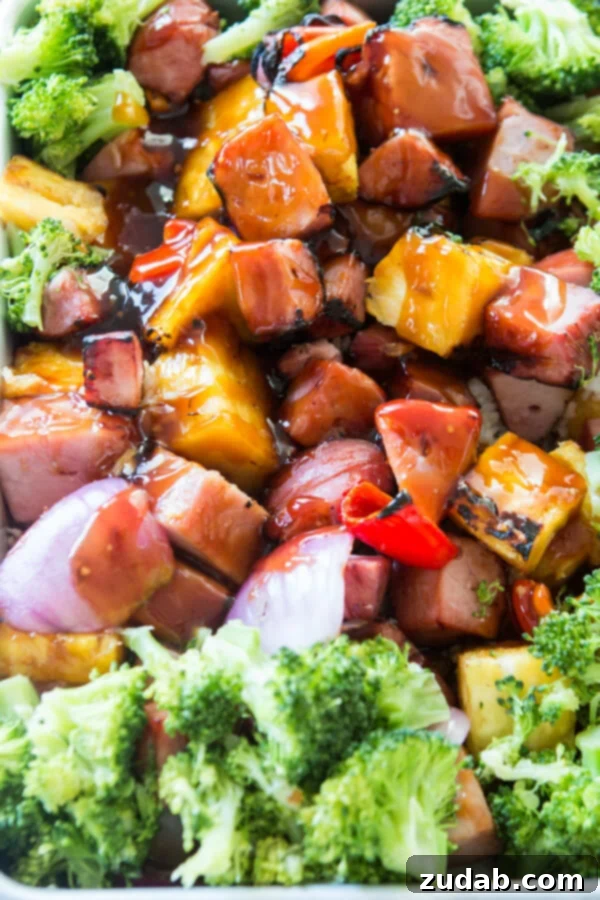 Hawaiian Ham and Pineapple Casserole: A delicious antidote to busy schedules. Embrace summer flavors all year with Hawaiian Ham and Pineapple Casserole. A perfect family meal solution. ohsweetbasil.com