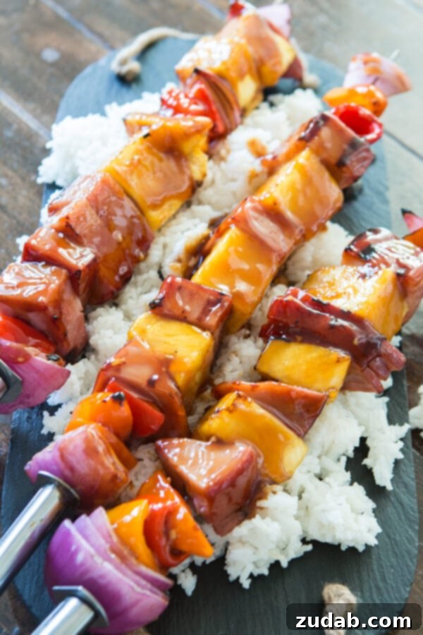 Hawaiian Ham and Pineapple: Two delicious dishes in one. Transform grilled Hawaiian Ham and Pineapple Kabobs into a hearty casserole for a flexible and flavorful meal. ohsweetbasil.com