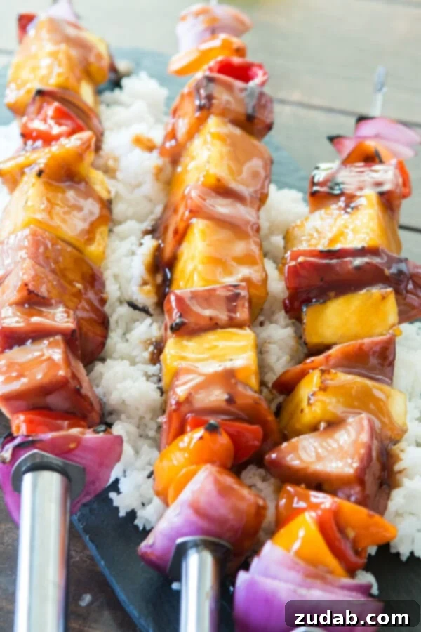Coconut Rice: The aromatic foundation for your tropical feast. Delicious coconut rice, a perfect side for Hawaiian Ham and Pineapple Casserole. ohsweetbasil.com