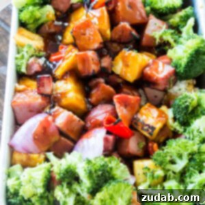 Hawaiian Ham and Pineapple Casserole, a delightful tropical-inspired dish perfect for family dinners. ohsweetbasil.com