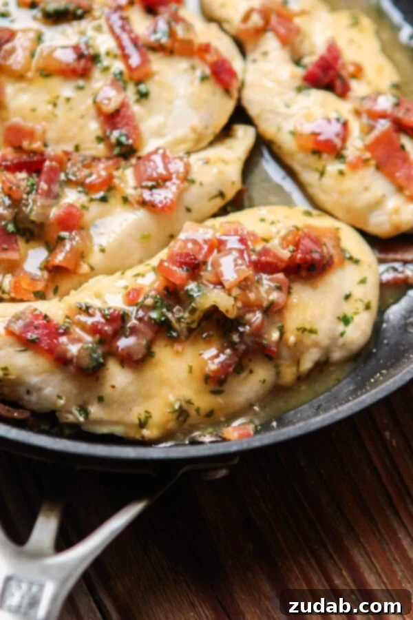 An inviting close-up of the Honey Mustard Bacon Chicken Skillet, perfect for highlighting its deliciousness and suitability for a healthier diet. ohsweetbasil.com paleo, Whole 30, dairy-free