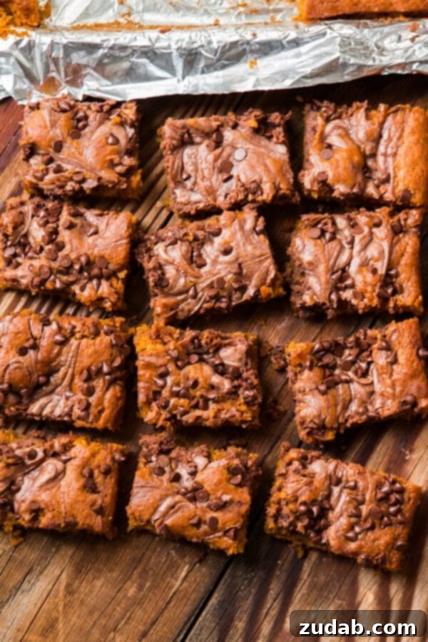 Nutella Swirled Pumpkin Bars - The Best Pumpkin Recipe for the Holidays Nutella Swirled Pumpkin Bars: Your Ultimate Holiday Dessert