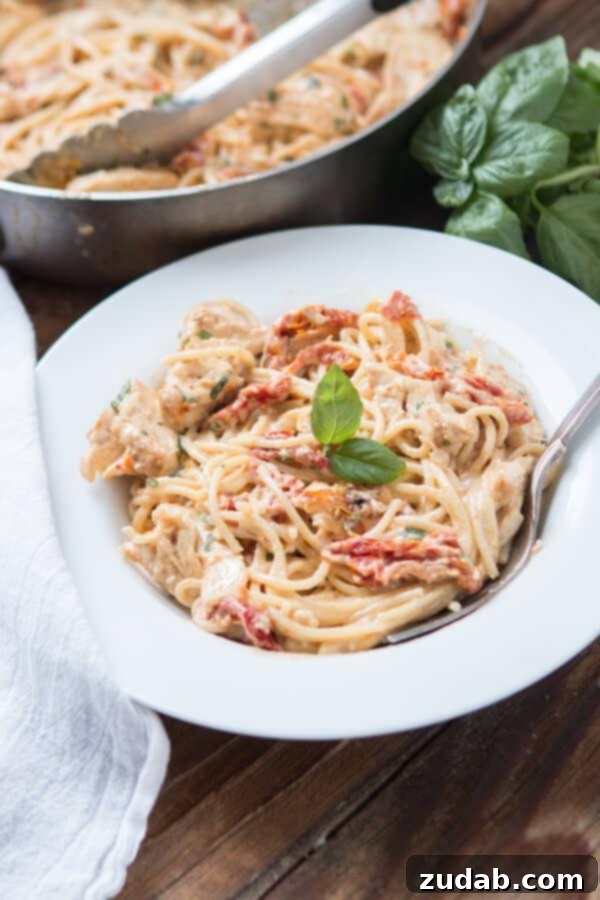 Velvety Sun-Dried Tomato Chicken Pasta in Minutes 5 A serving of creamy sun-dried tomato chicken pasta with fresh basil