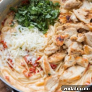 Creamy sun-dried tomato chicken pasta in a bowl
