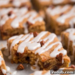 Spiced Pumpkin Harvest Squares 2 Enjoy fall with all its beautiful leaves, cool crisp air, and yummy treats like these chewy Cinnamon Pumpkin Cookie Bars.
