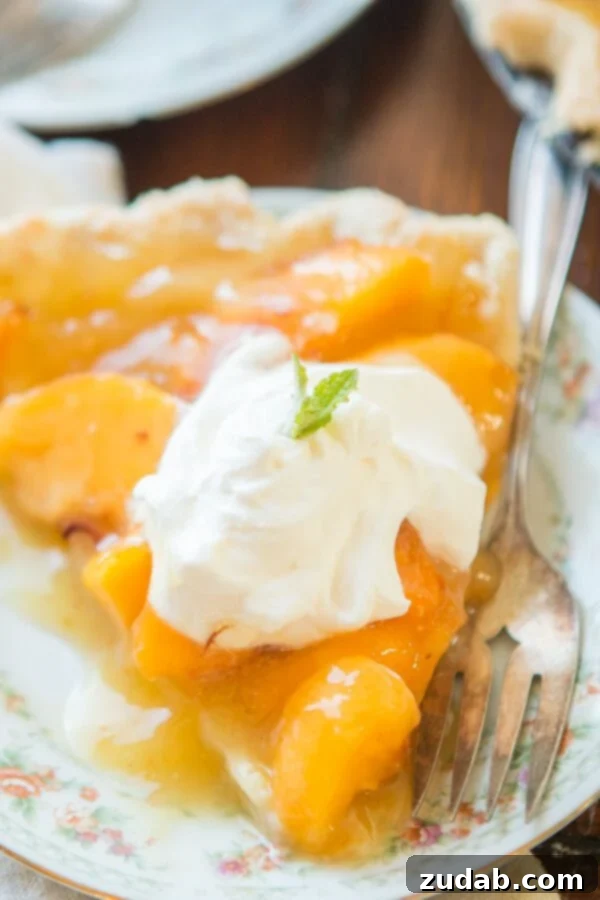 Homemade Lemon Jello Peach Pie with a golden crust A whole Lemon Jello Peach Pie, beautifully set and ready to be cut