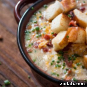A rich and creamy ultimate cheeseburger soup, ready to be served and enjoyed.