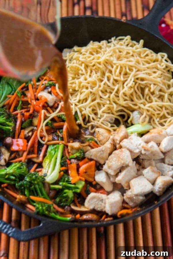 Only got 15 minutes to whip together a fresh and yummy dinner? Try our quick and easy 15 minute chicken stir fry and ditch the grilled cheese. pouring stir fry sauce into a skillet of chicken stir fry