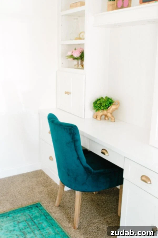 My New Office Tour 2 Wide shot of our beautifully designed home office featuring custom cabinetry and a stylish chandelier.